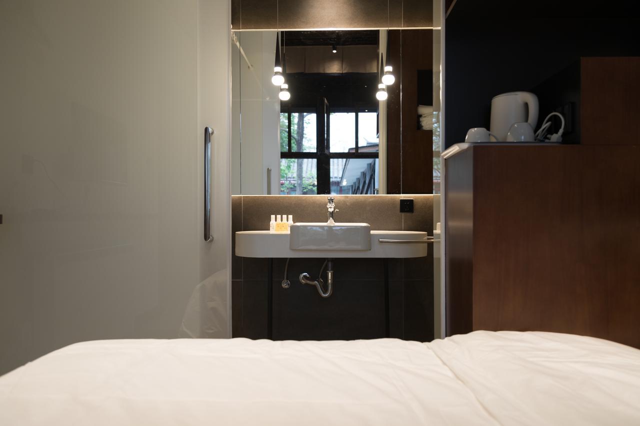 Courtyard Guesthouse, Пекин Экстерьер фото