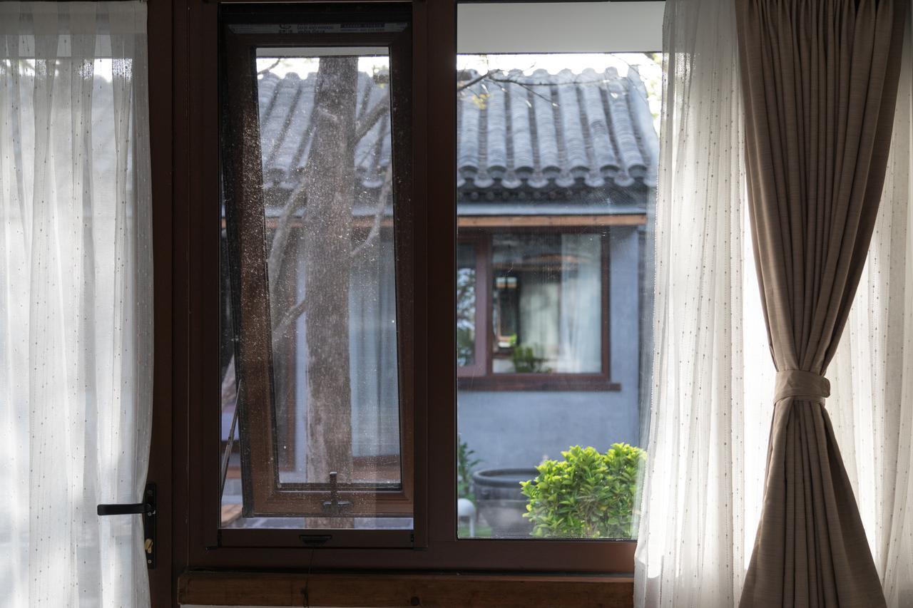 Courtyard Guesthouse, Пекин Экстерьер фото